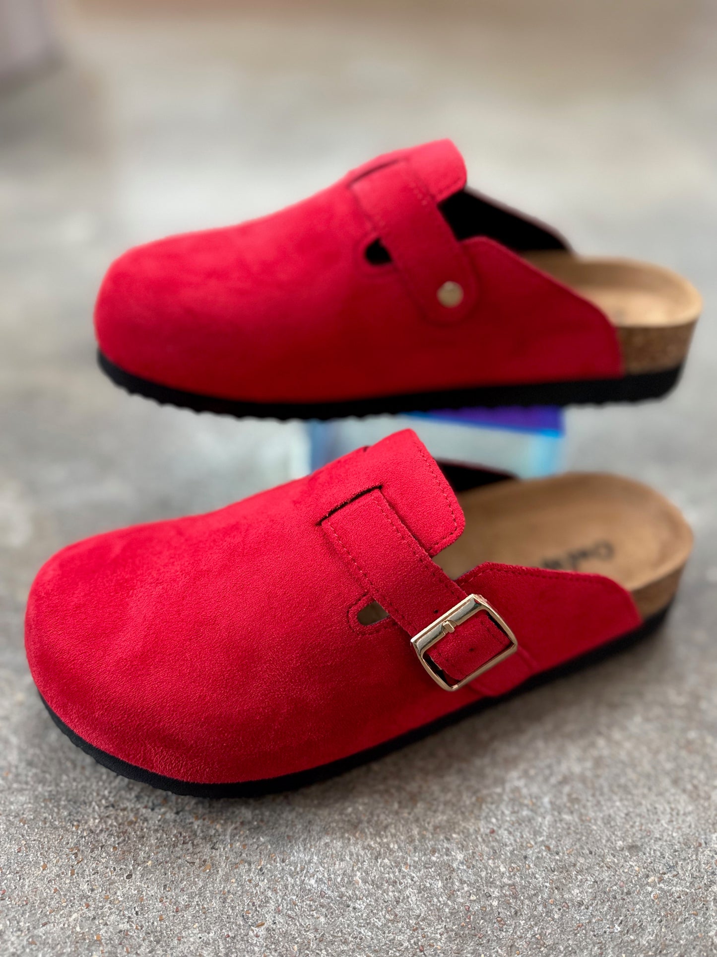 Buckle accent detail on Outwoods Ace red mules
