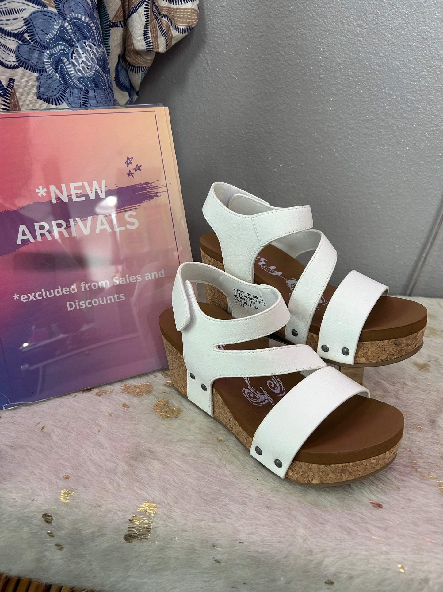 white multi strap with hook and latch closure