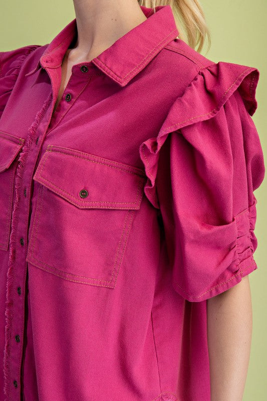 Ruffled gathered sleeve detail on women’s magenta linen shirt from Texas boutique