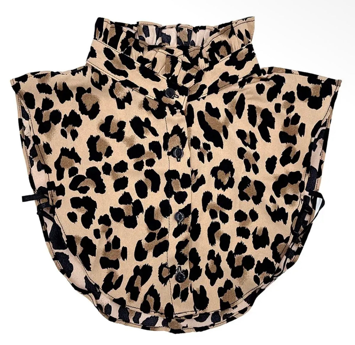 Close-up of tan and black leopard print faux shirt collar
