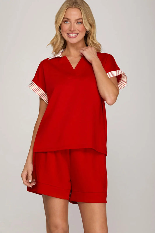 Women’s red collared knit top