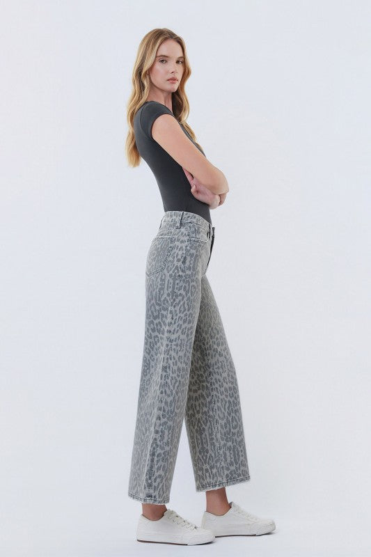 Side view of women’s grey leopard wide leg jeans boutique Texas
