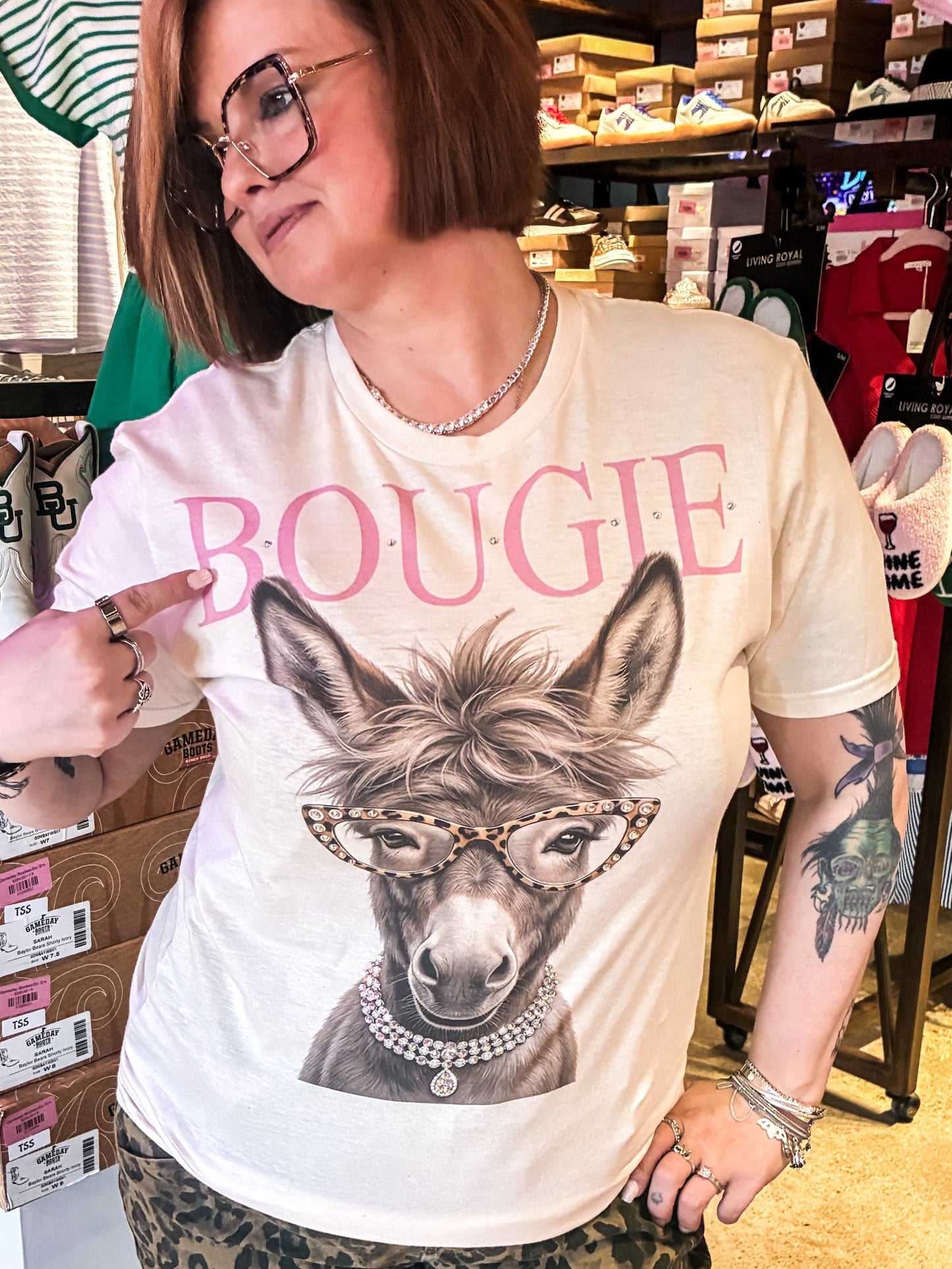 Women’s graphic tee featuring a fashionable donkey wearing leopard glasses, jewelry, and a rhinestone BOUGIE graphic.