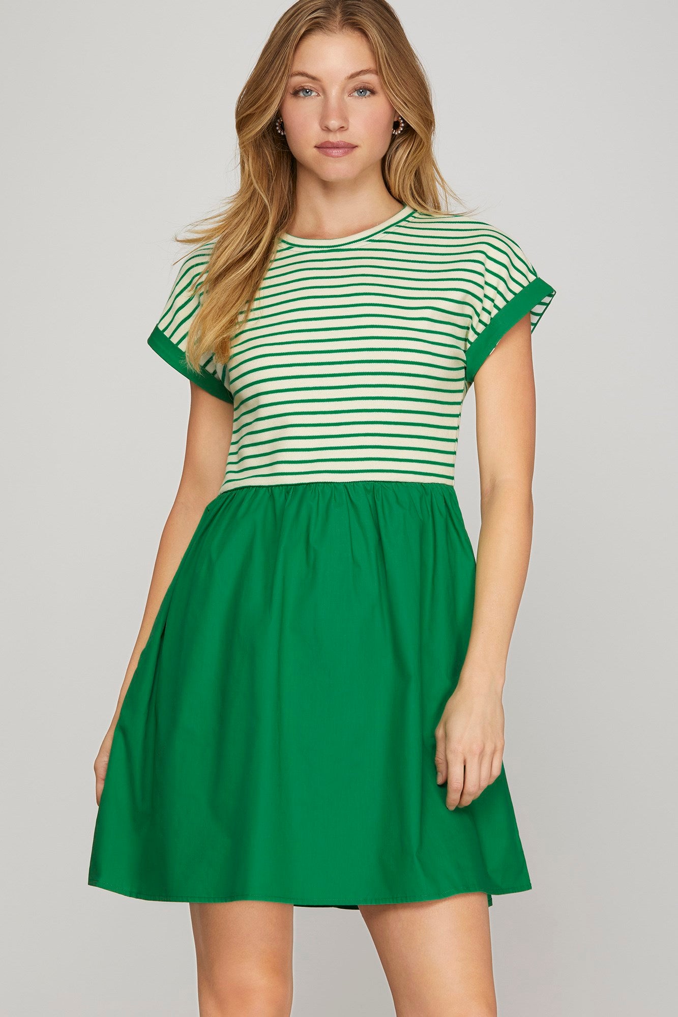Front view of green striped knit cap sleeve mini dress