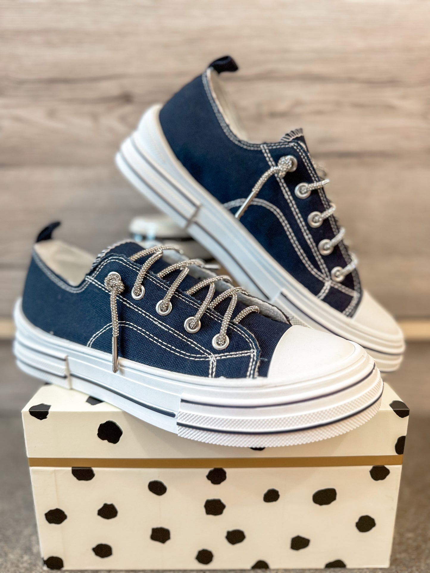 Navy sneakers with rhinestone laces