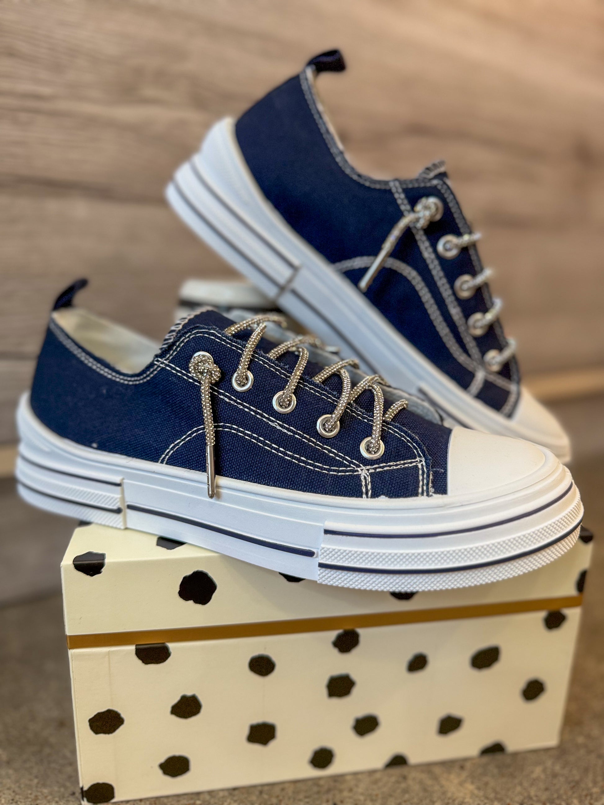 Navy sneakers with rhinestone laces