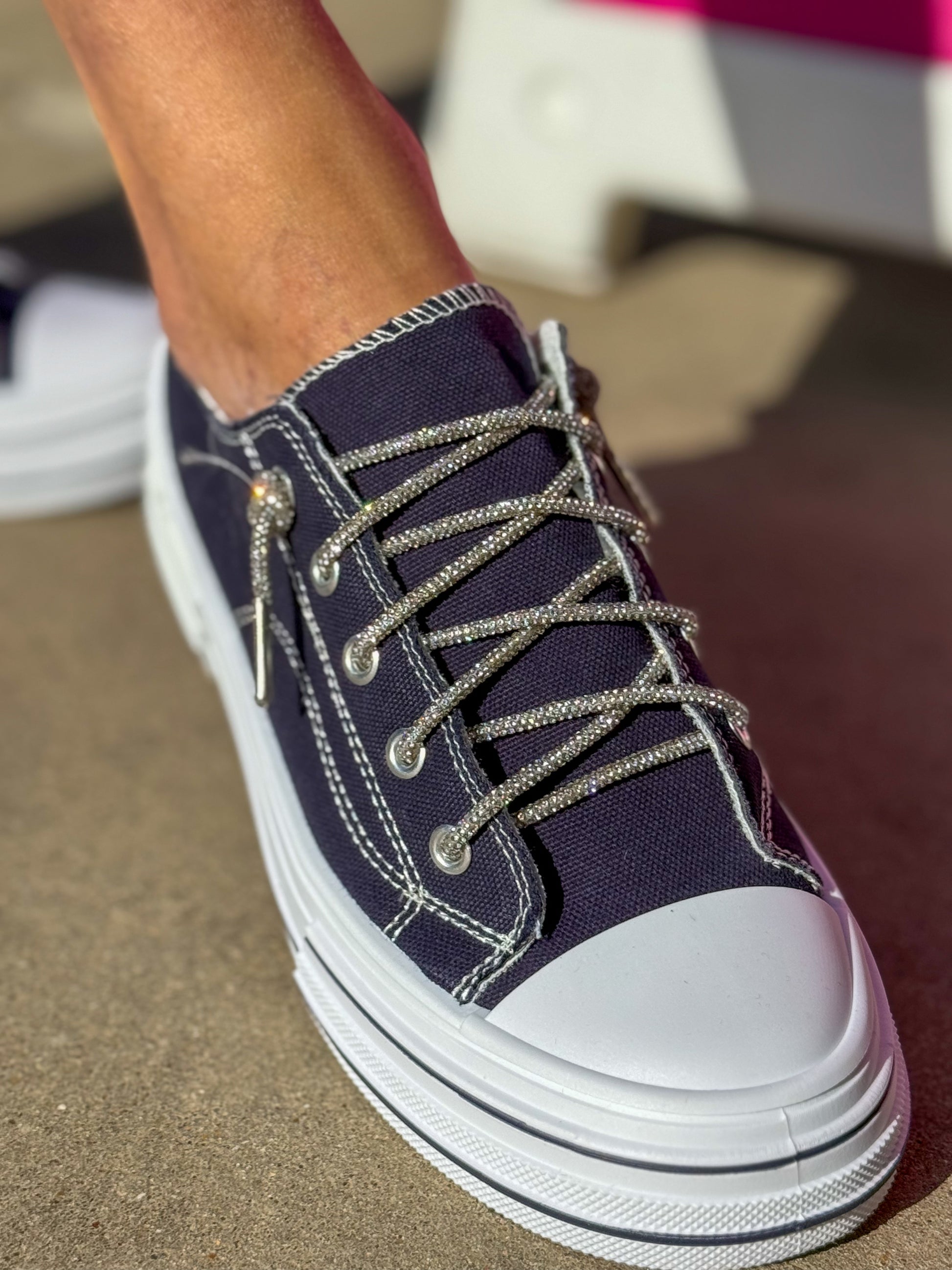 navy sneaker with rhinestone shoelace