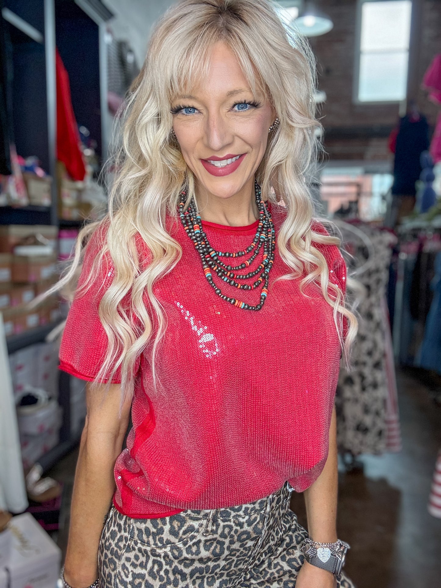 Red sweater top with tiny sequins from Twisted Sisters Shoetique