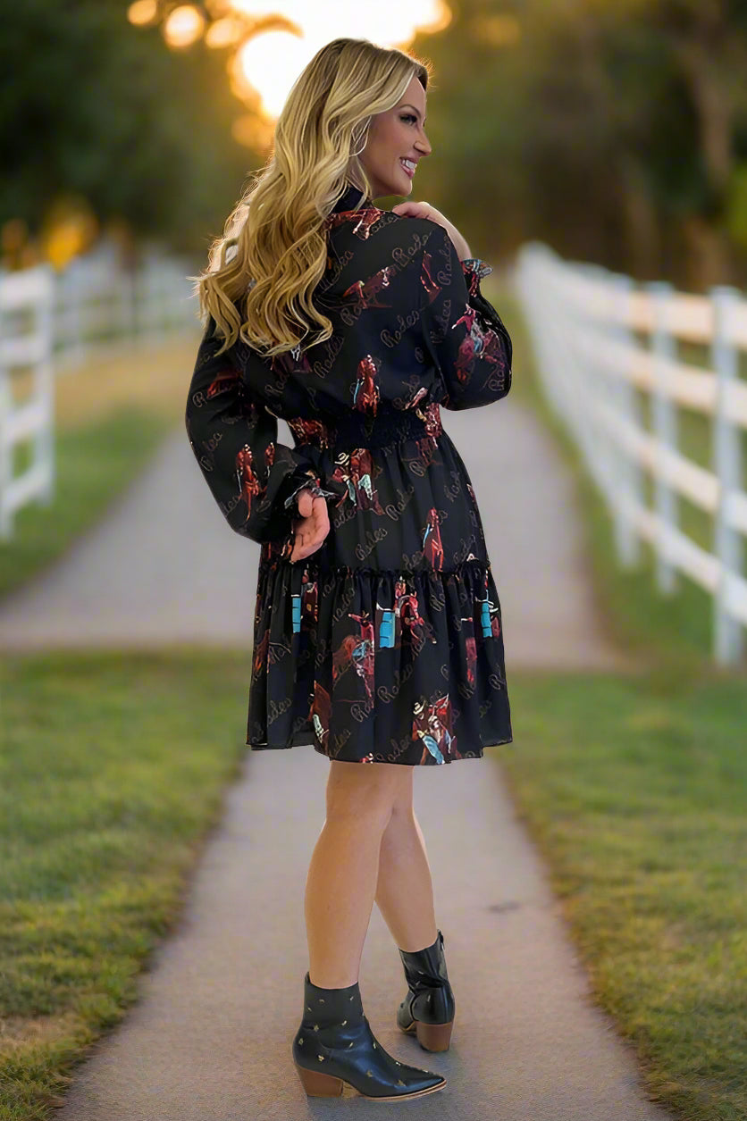 Woman wearing a black dress with horse print 