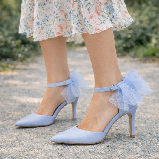 Light blue ankle strap heels with tulle bow detail