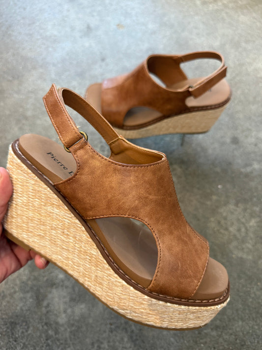 Women’s brown wedge sandals with woven platform sole