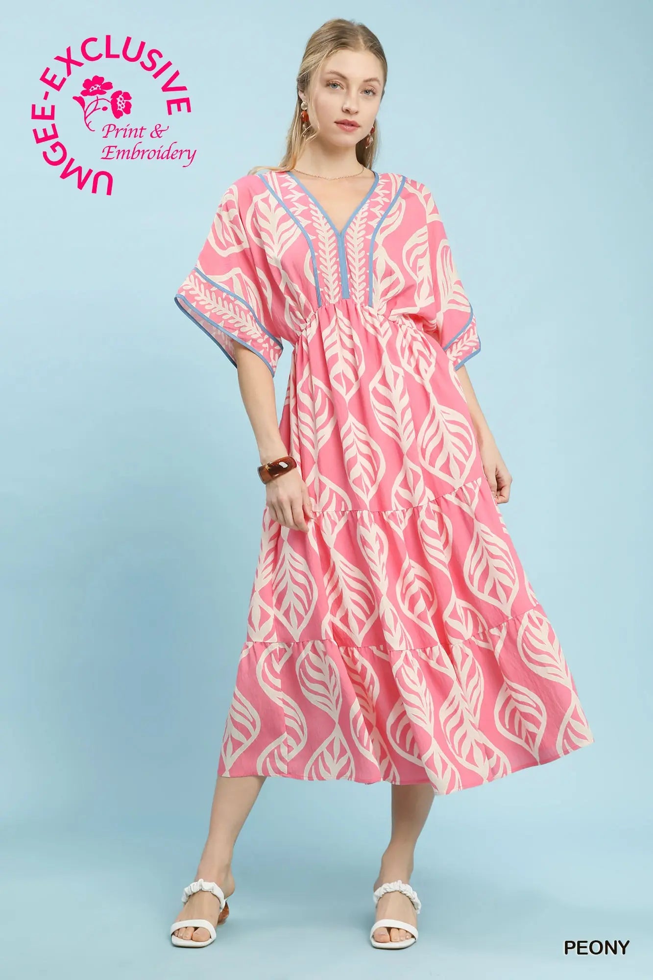 Boho peony maxi dress with bold leaf print and deep V neckline