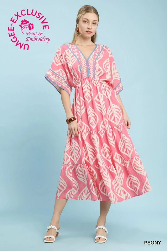 Boho peony maxi dress with bold leaf print and deep V neckline