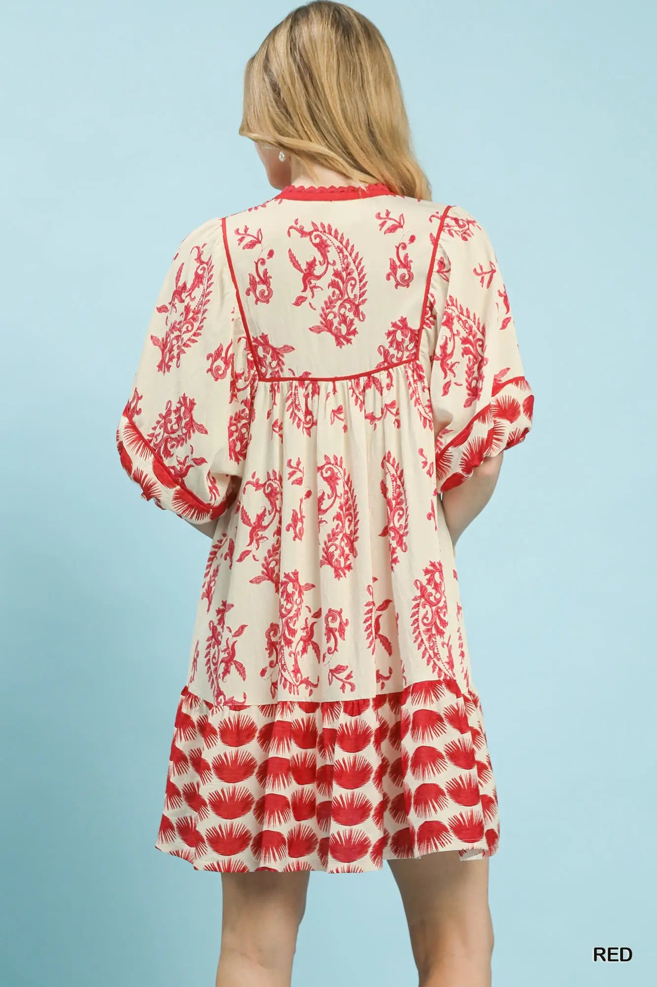 Lined abstract print mini dress for boutique style