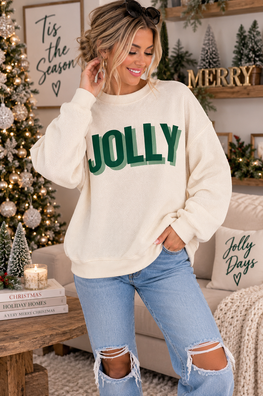 Cream JOLLY cloudy knit Christmas top with dark green graphic lettering