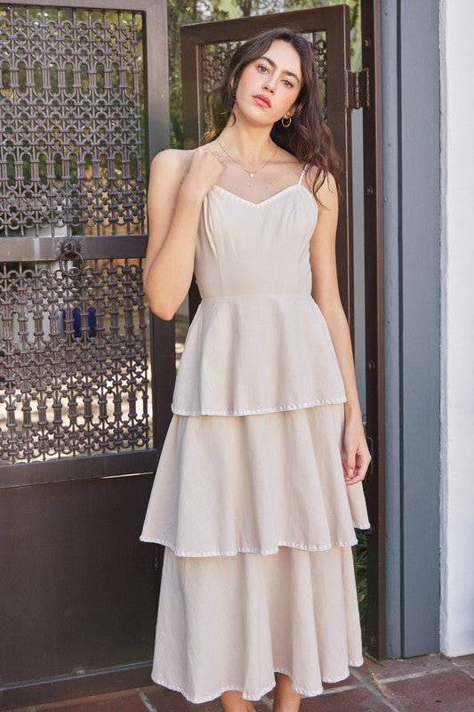 beige tiered ruffle midi dress with contrasting hems 