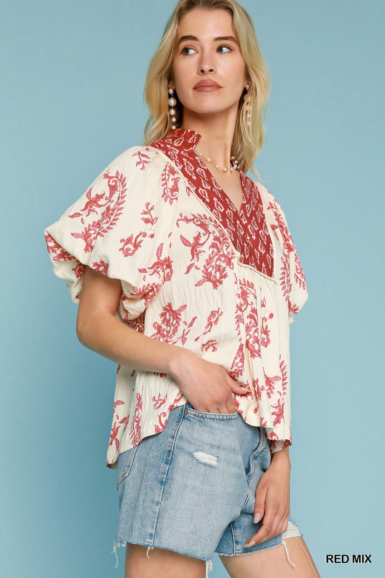 white top with red  print red yoke with red pleated collar