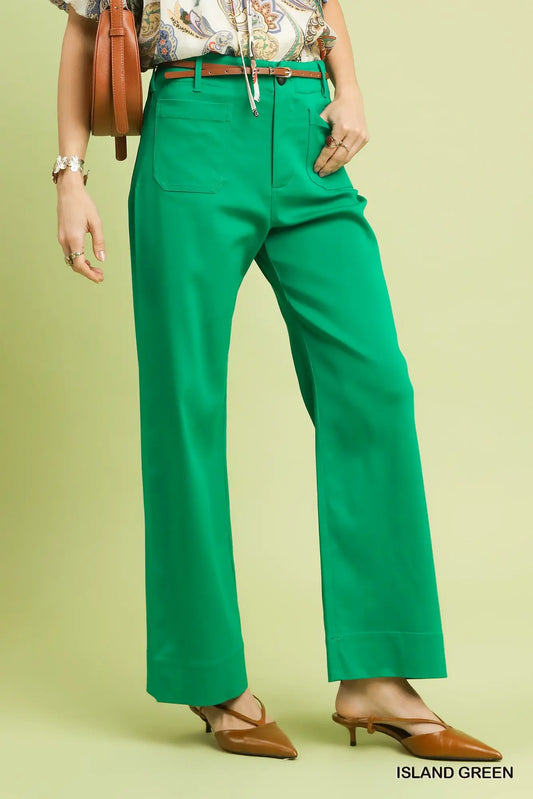 Women’s boutique green stretch pants with button detail from Twisted Sisters Shoetique in Waco Texas