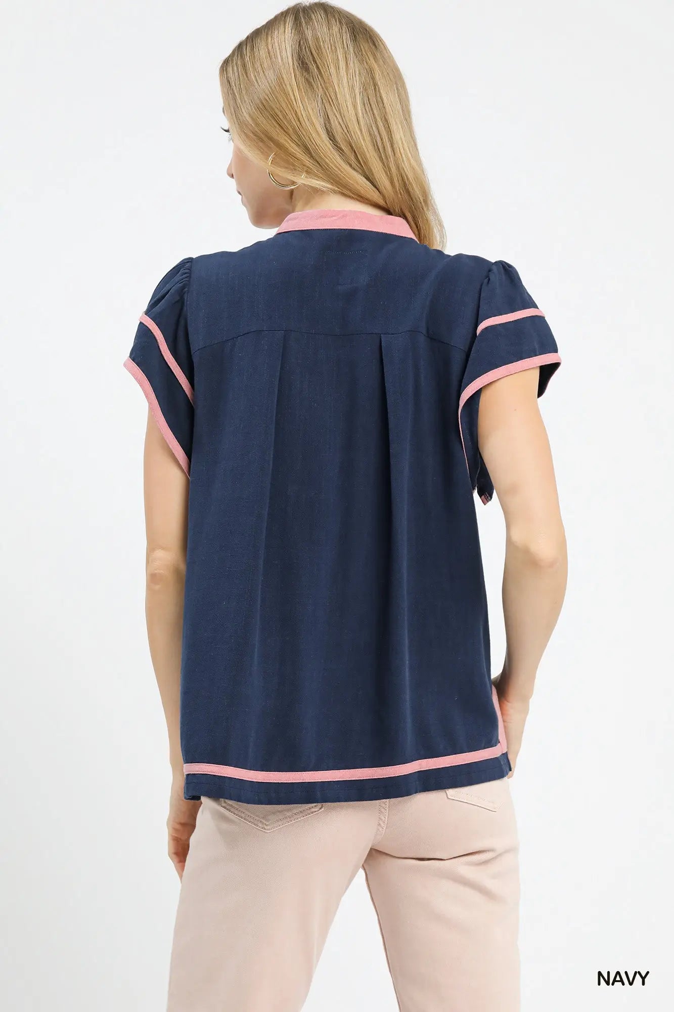Back view of women’s linen ruffle sleeve top from Waco boutique