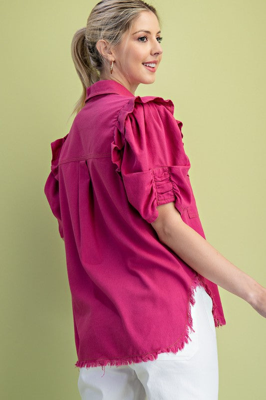 Back view of women’s magenta linen shirt from Waco boutique
