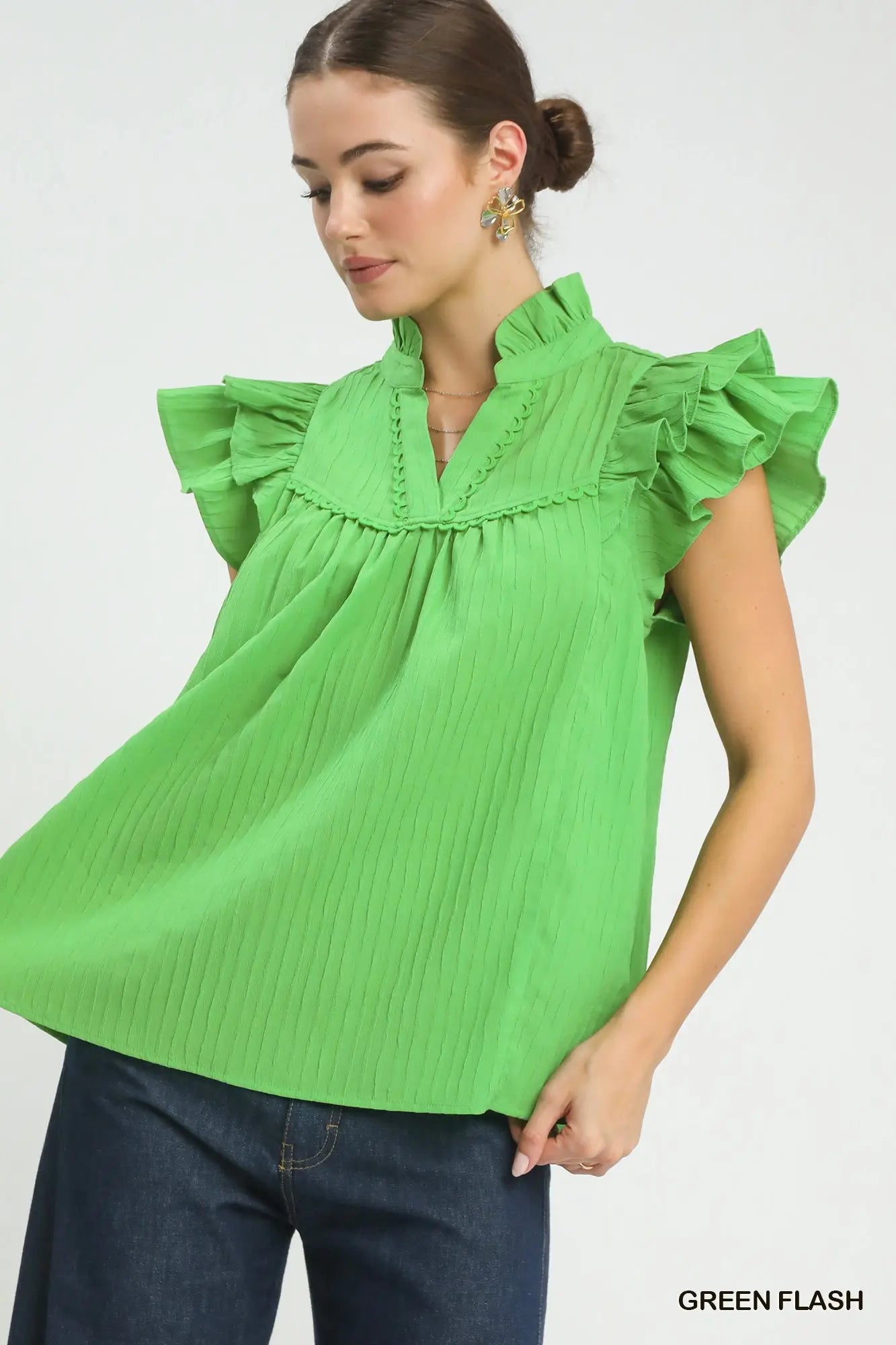 Trendy women’s green ruffle sleeve textured babydoll top from Twisted Sisters Shoetique in Waco Texas