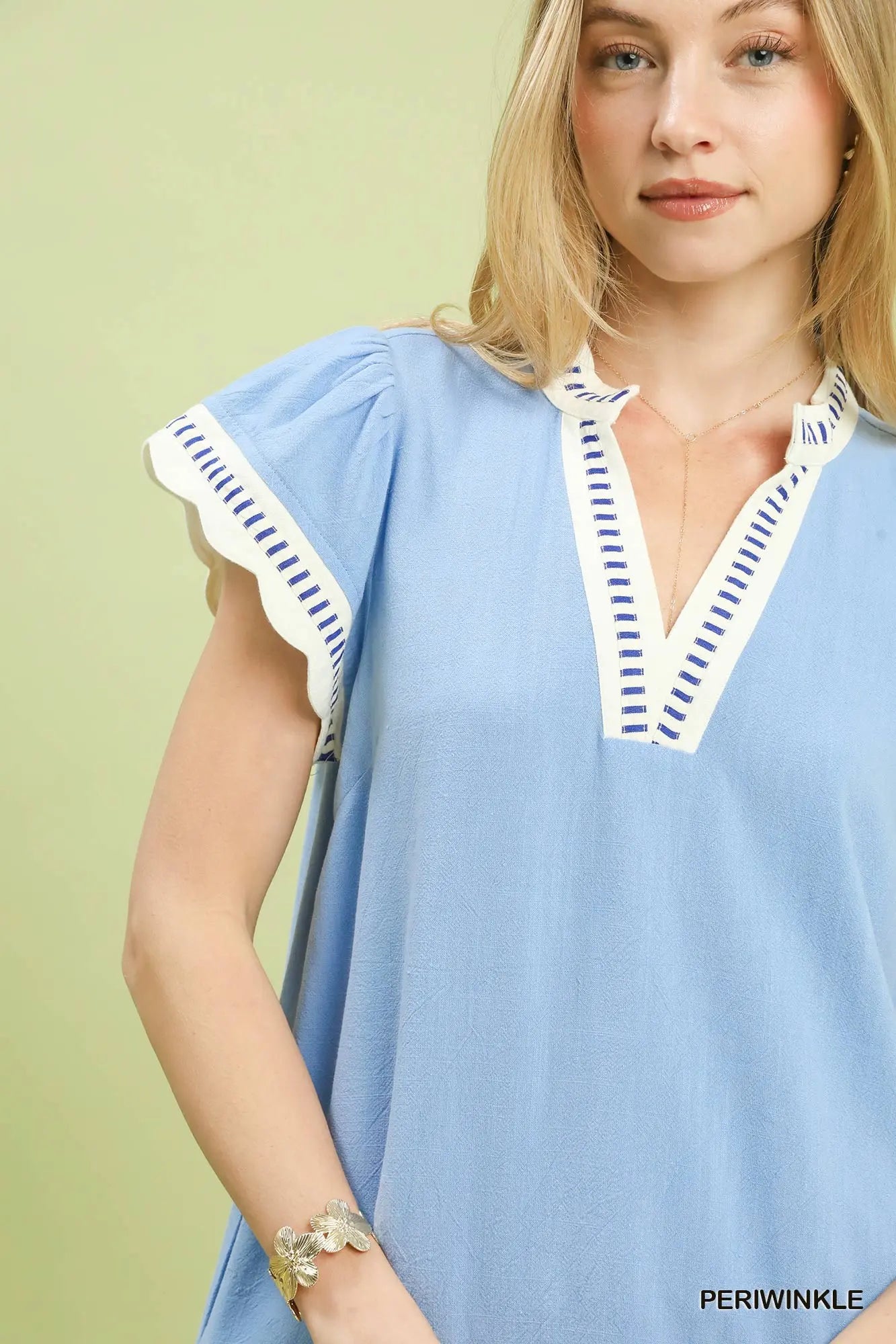 Side view of women’s scallop trim blouse boutique Texas