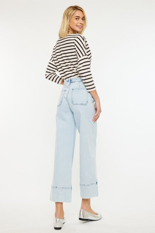 Back view of women’s KanCan light wash cropped jeans from Waco boutique