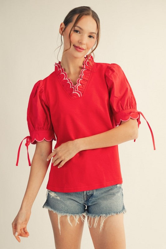 Women’s red embroidered puff sleeve top from Twisted Sisters Shoetique in Waco Texas