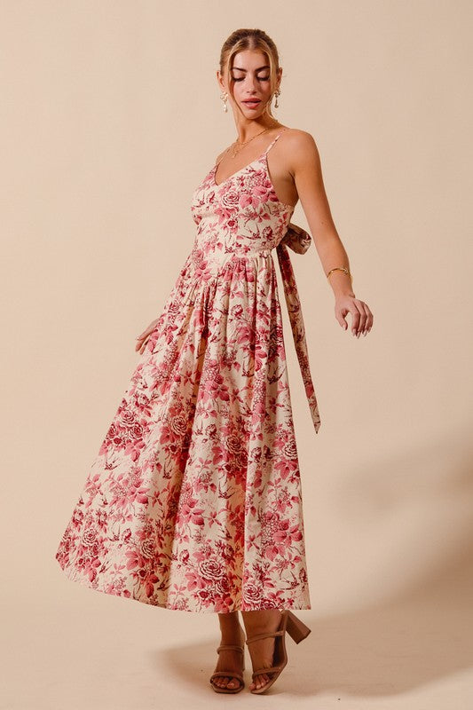 Women’s boutique rouge floral dress styled on model in Waco Texas
