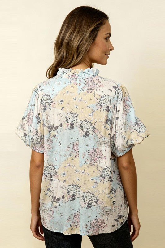 Back view of floral woven blouse