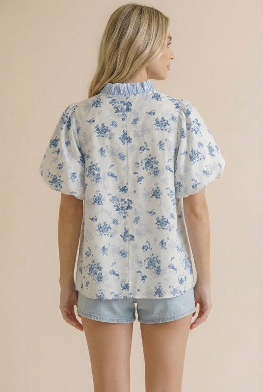 Back view of floral woven blouse
