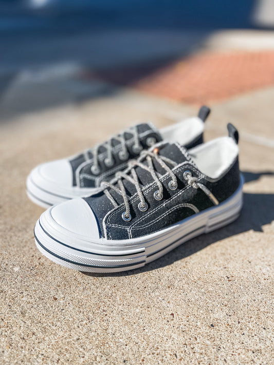 Black glitter sneakers with rhinestone laces