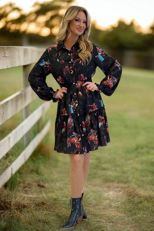 Woman wearing black western graphic long sleeve dress