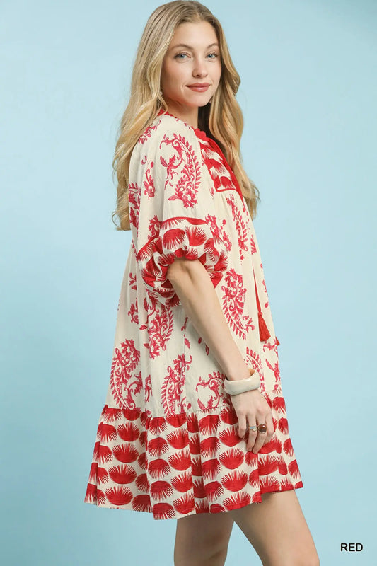 Women’s tiered mini dress with tassel tie neckline