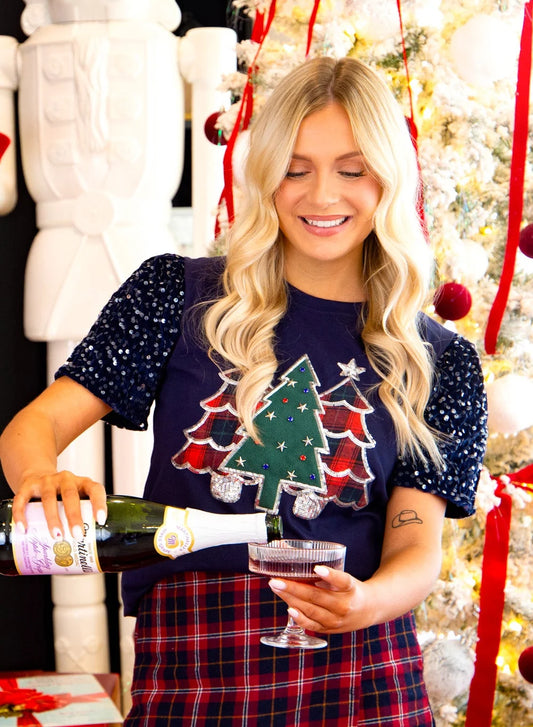 Christmas tree graphic with plaid, metallic embellishments and sparkling sequins on a navy top.