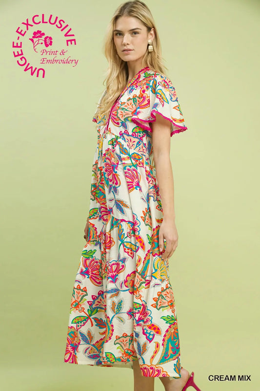 Cream boho tiered midi dress with lace trim V-neck and flutter sleeves
