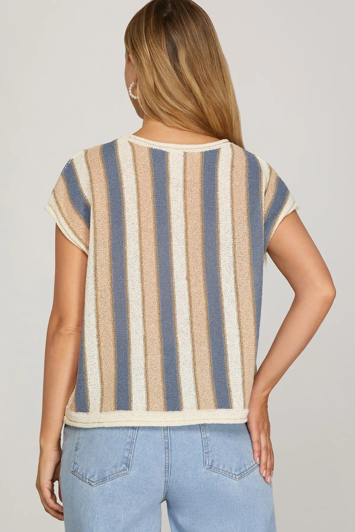 Relaxed fit striped sweater styled with denim