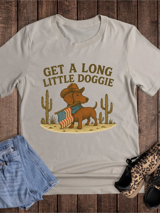 Get A Long Little Doggie western graphic tee with cowboy dachshund and American flag