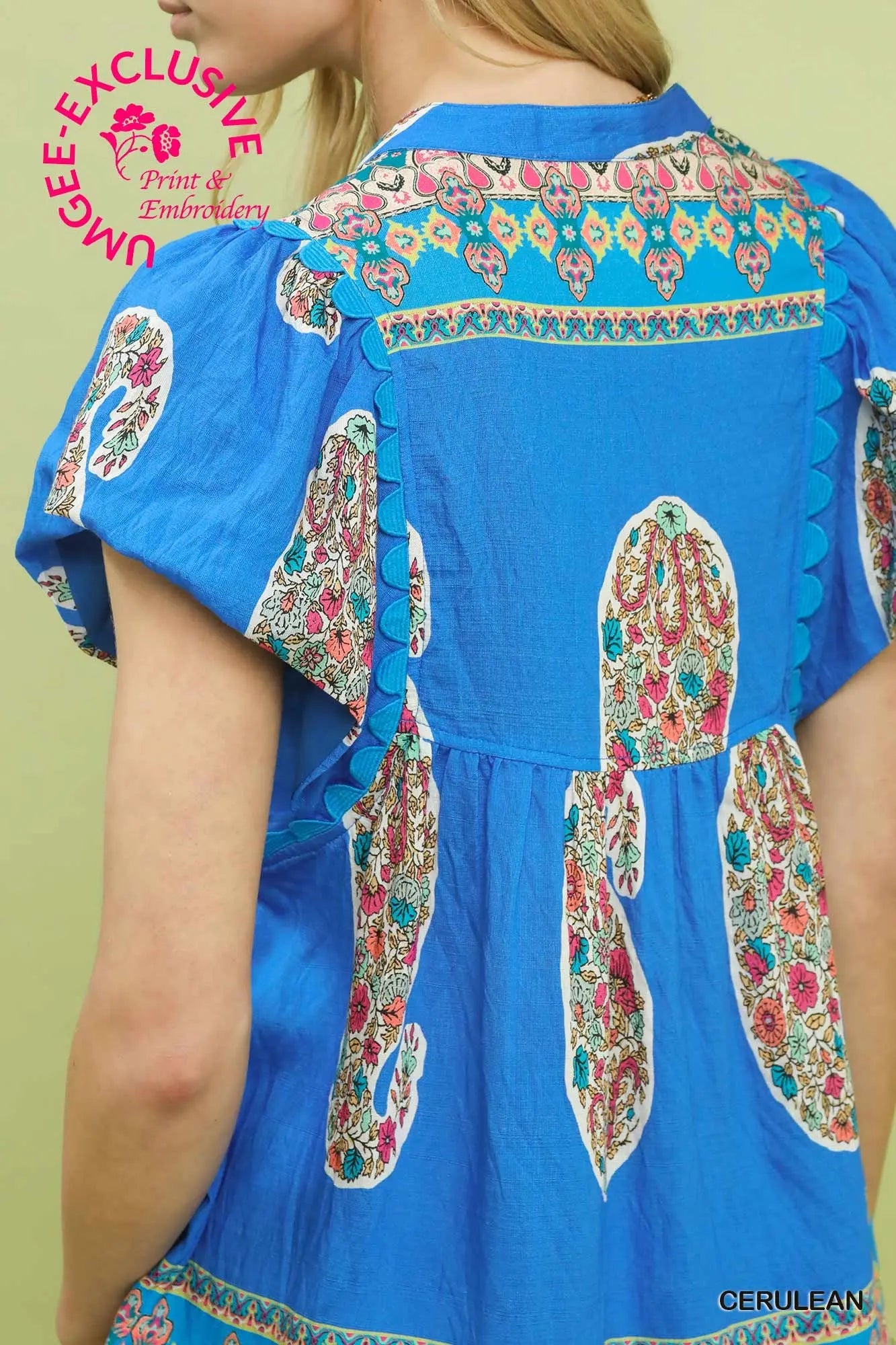 Casual cerulean boutique blouse styled with denim