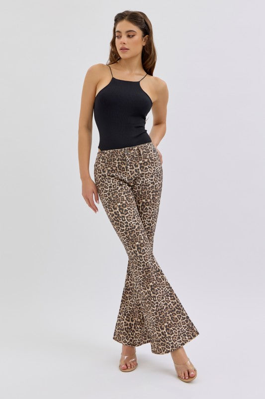 Trendy women’s Cello mid rise leopard flare jeans from Twisted Sisters Shoetique in Waco Texas