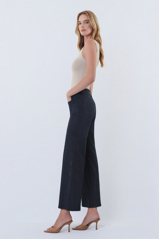 Side view of women’s striped wide leg jeans boutique Texas