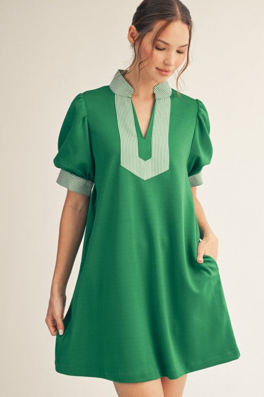 Women’s green puff sleeve shift dress from Twisted Sisters Shoetique in Waco Texas