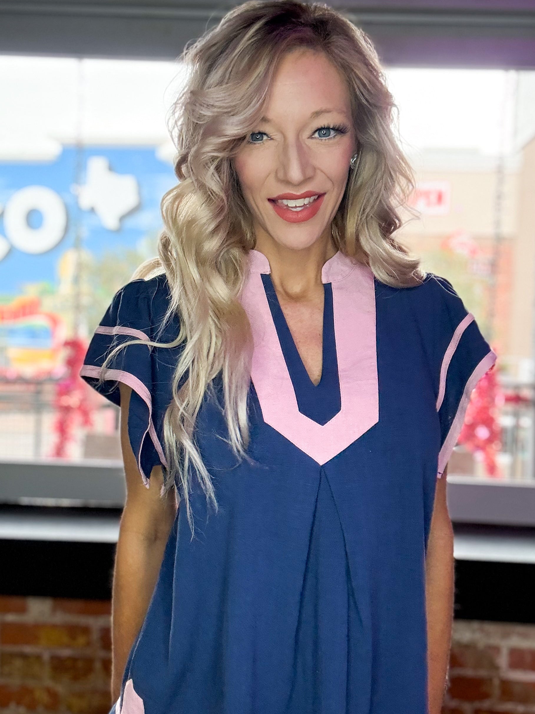 Women’s boutique blouse from Twisted Sisters Shoetique in Waco Texas