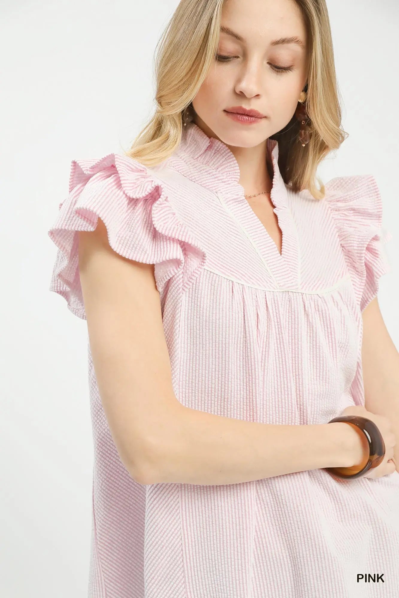 Trendy women’s pink ruffle sleeve top from Twisted Sisters Shoetique in Waco Texas