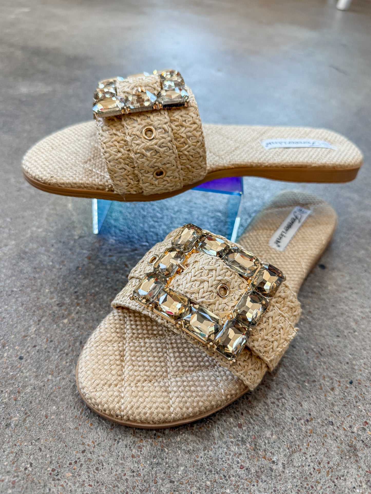 Women’s boutique raffia flat slide sandals from Twisted Sisters Shoetique in Waco Texas