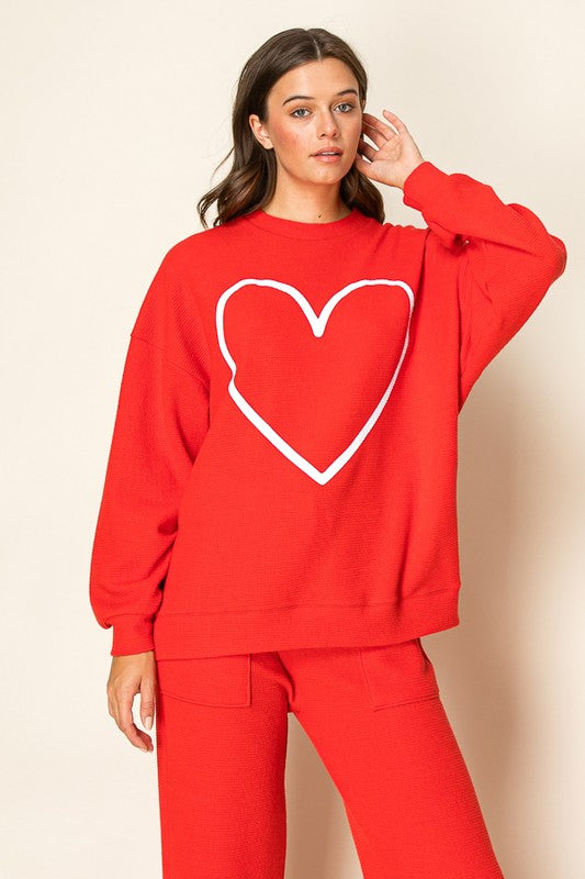 Women’s boutique long sleeve top from Twisted Sisters Shoetique in Waco Texas