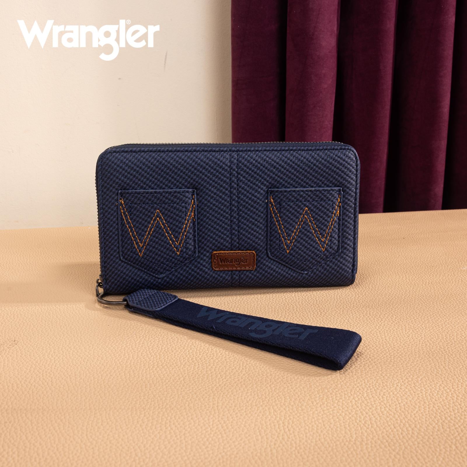 Wrangler navy wristlet wallet with double Western pocket design and W stitching